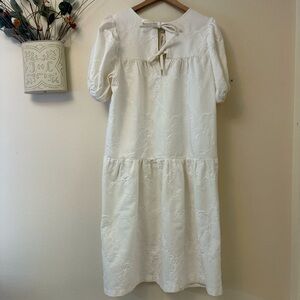 Handmade white embroidered tiered with tie front detail